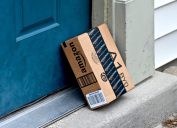 amazon box outside blue residential door