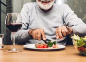 Older man eating dinner