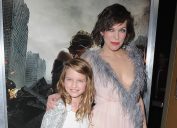 Milla Jovovich and daughter Ever Anderson arrive at the Los Angeles premiere "Resident Evil: The Final Chapter" at Regal LA Live: A Barco Innovation Center on January 23, 2017 in Los Angeles, California