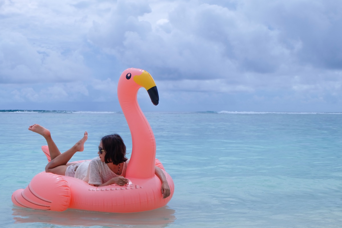 Woman on a flamingo float