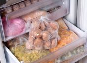 open freezer full of food in bags