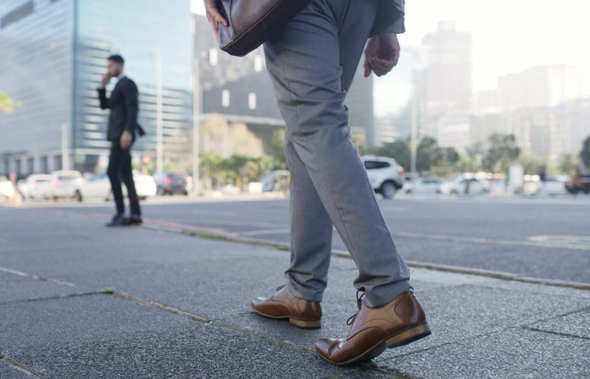 Shot of an unrecognizable businessman walking through the city