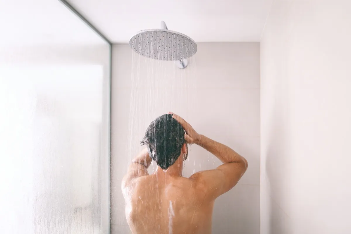 Man taking a shower. 