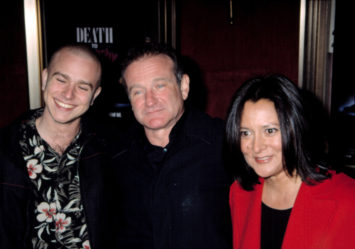Zak Williams, Robin Williams, and Marsha Garces Williams at the premiere of "Death to Smoochy" in 2002 