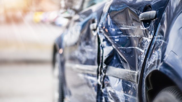 Damage on side door after car crash