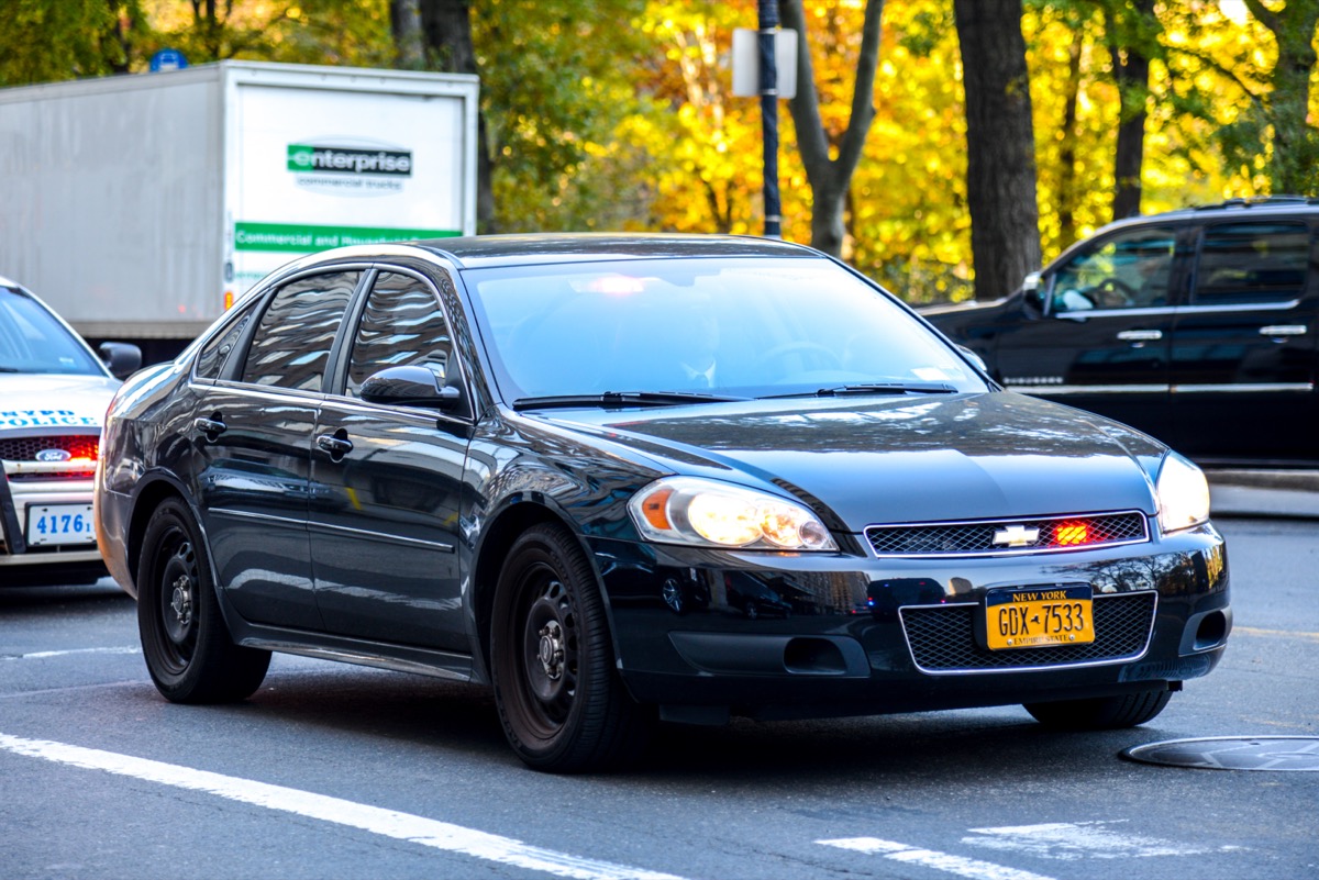 A black Chevrolet Impala on the street