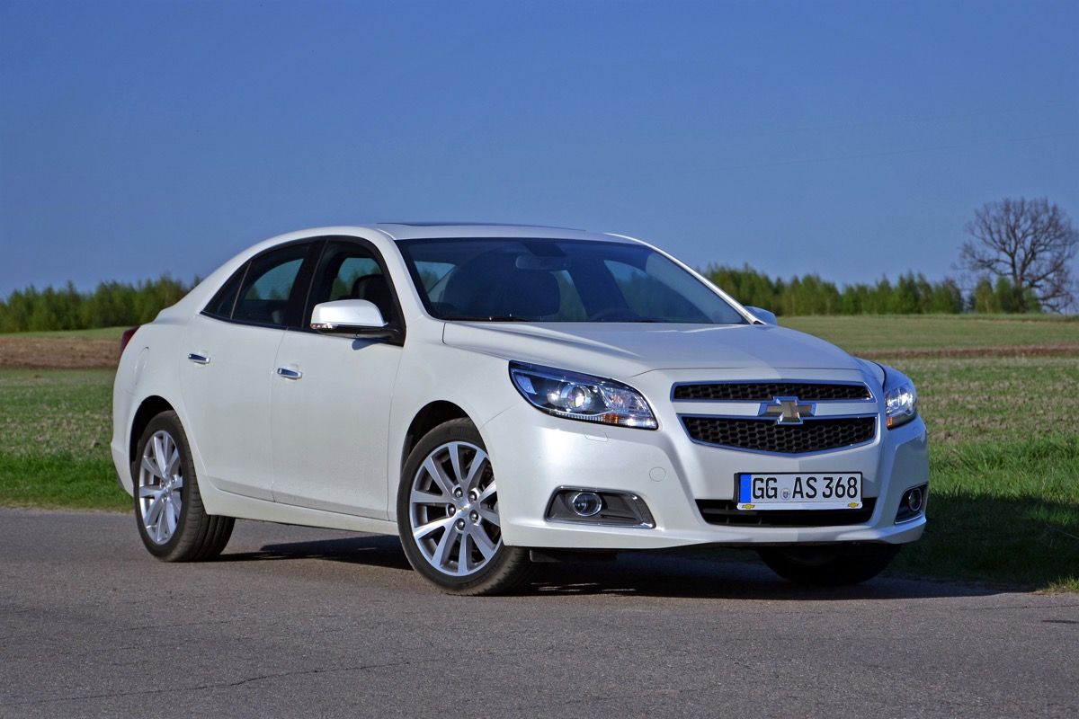 A white Chevrolet Malibu car