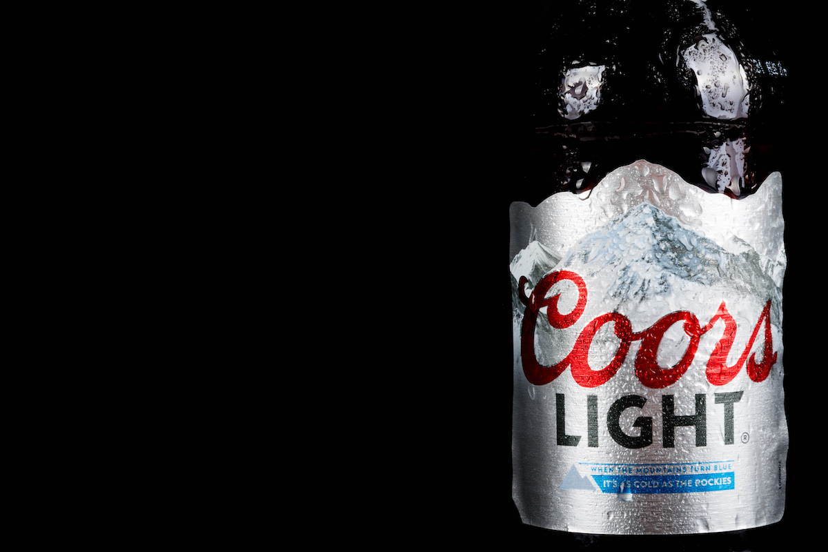 Bottle of Coors Light isolated on a black background background