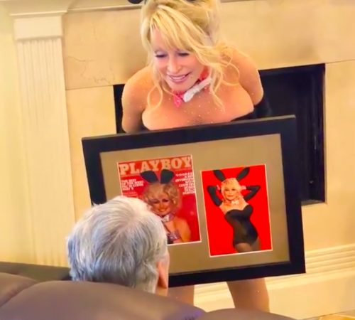 Dolly Parton presenting the new "Playboy" picture to husband Carl Dean in July 2021