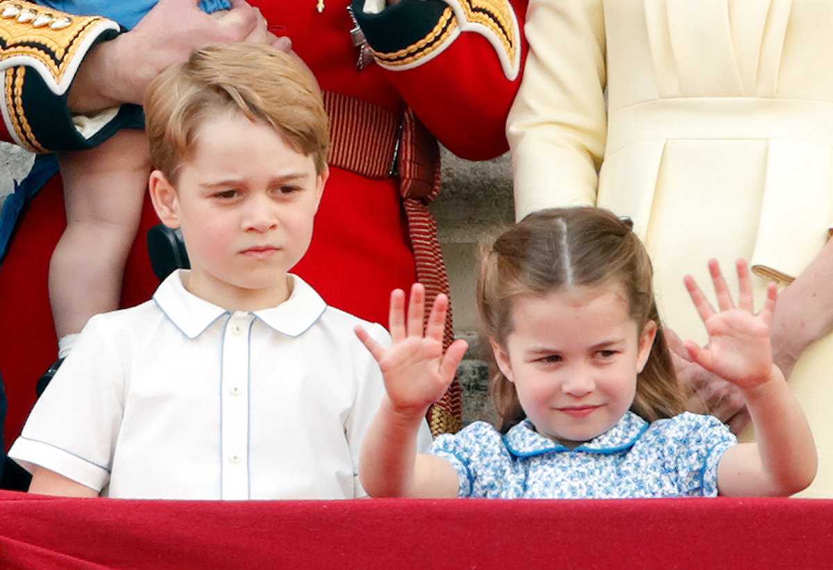 Prince George of Cambridge and Princess Charlotte of Cambridge watch a flypast from the balcony of Buckingham Palace during Trooping The Colour, the Queen's annual birthday parade, on June 8, 2019 in London, England.