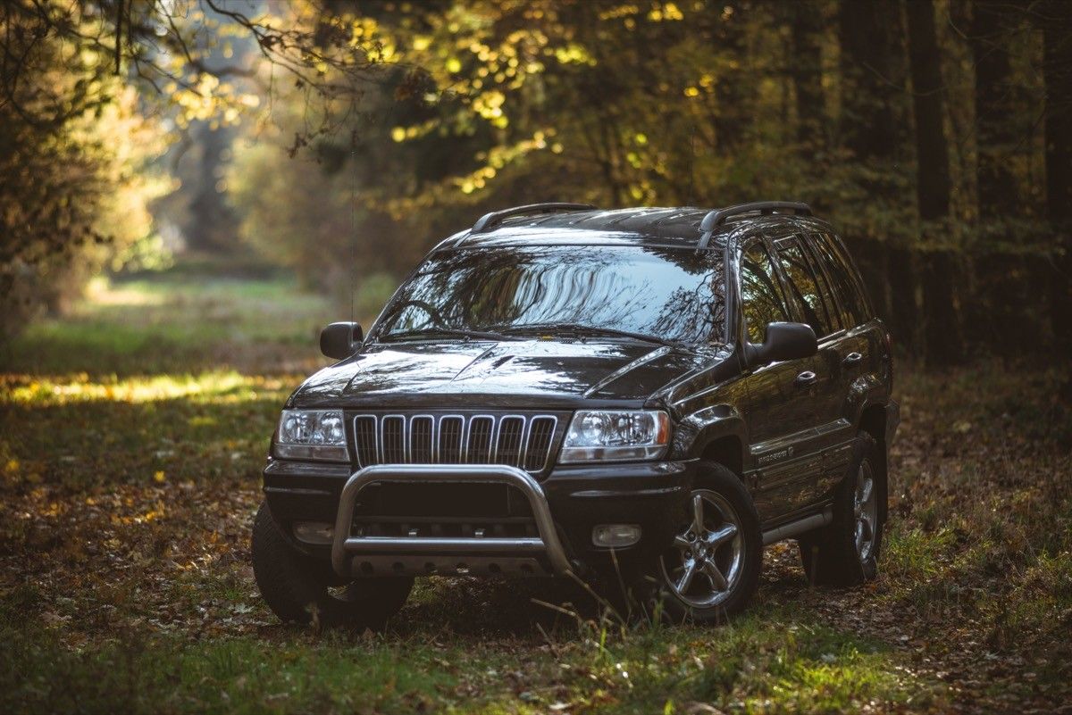 A black Jeep Grand Cherokee outside