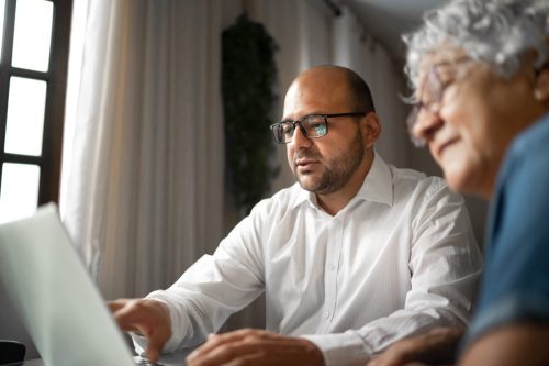 Advisor helping a woman at home