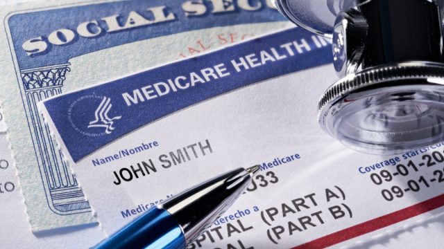 THE SEA RANCH, CALIFORNIA - November 12, 2018: Medicare Health Insurance and Social Security card on medical report with stethoscope. Medicare is a national health insurance program provided by the United States for seniors 65 and older. Social Security is a federal insurance program that gives benefits to retired, unemployed and disabled people.