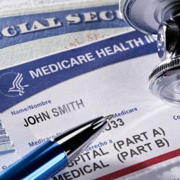 THE SEA RANCH, CALIFORNIA - November 12, 2018: Medicare Health Insurance and Social Security card on medical report with stethoscope. Medicare is a national health insurance program provided by the United States for seniors 65 and older. Social Security is a federal insurance program that gives benefits to retired, unemployed and disabled people.