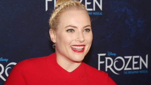 A closeup of Meghan McCain standing on the red carpet at an event