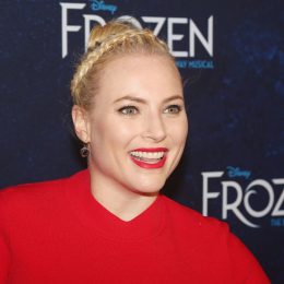A closeup of Meghan McCain standing on the red carpet at an event