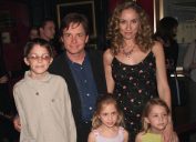 Actor Michael J. Fox arrives with his family, wife Tracy, son Sam, and twin daughters Schuyler and Aquinnah, at the New York premiere of the new Disney film 'Atlantis: The Lost Empire,' at the Ziegfeld Theater in New York City. June 6, 2001.