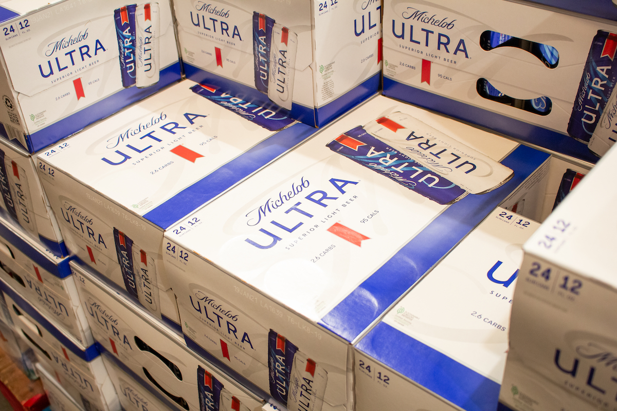 A view of several cases of Michelob Ultra beer, on display at a local big box grocery store.