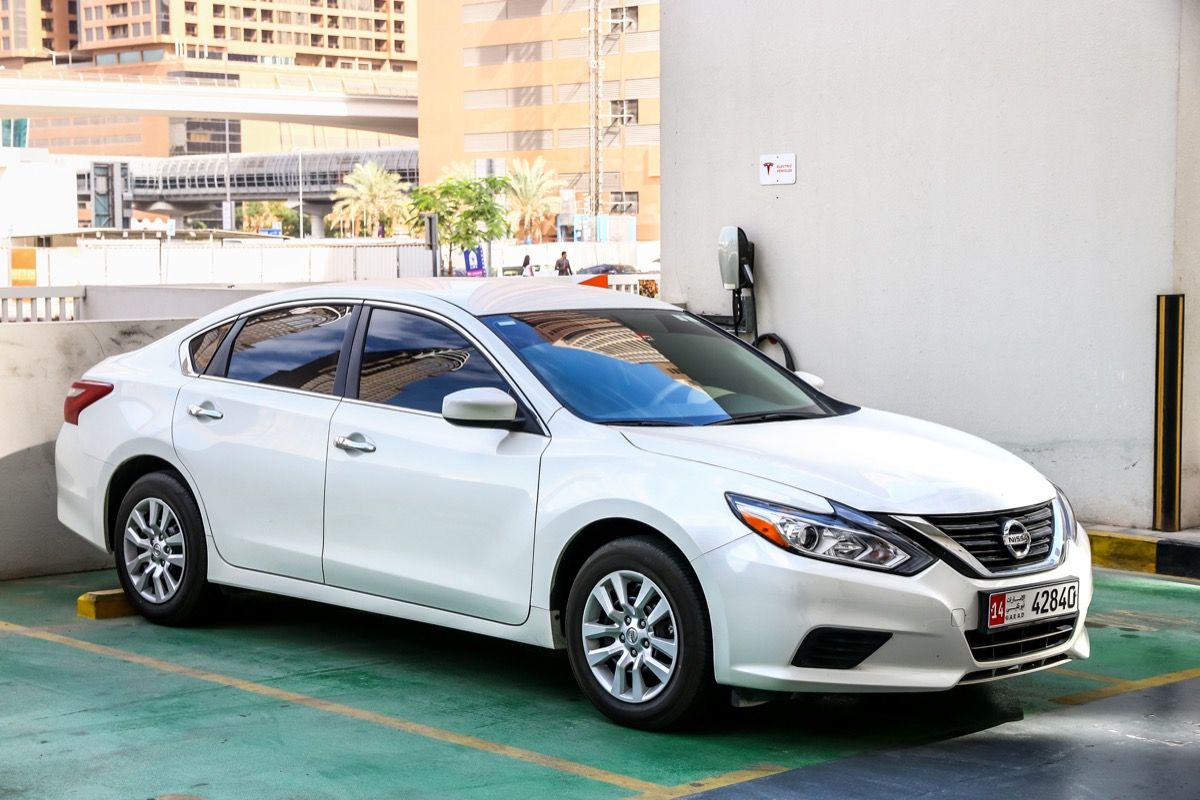 A white Nissan Altima