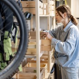 woman looking through stuff she's left in garage