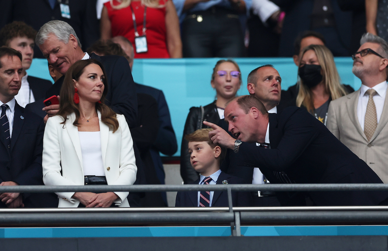 Catherine, Duchess of Cambridge, Prince George of Cambridge and Prince William, Duke of Cambridge and President of the Football Association look on during the UEFA Euro 2020 Championship Final between Italy and England at Wembley Stadium on July 11, 2021 in London, England.