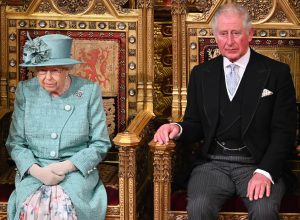 Queen Elizabeth II and Prince Charles, Prince of Wales attend the State Opening of Parliament in the House of Lord's Chamber on December 19, 2019 in London, England.