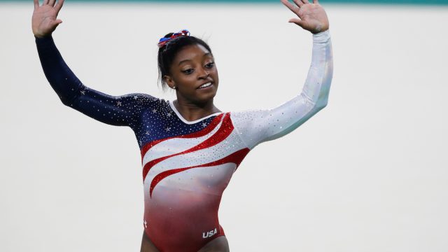 Simone Biles performing floor exercise at the 2016 Rio Olympics
