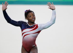 Simone Biles performing floor exercise at the 2016 Rio Olympics