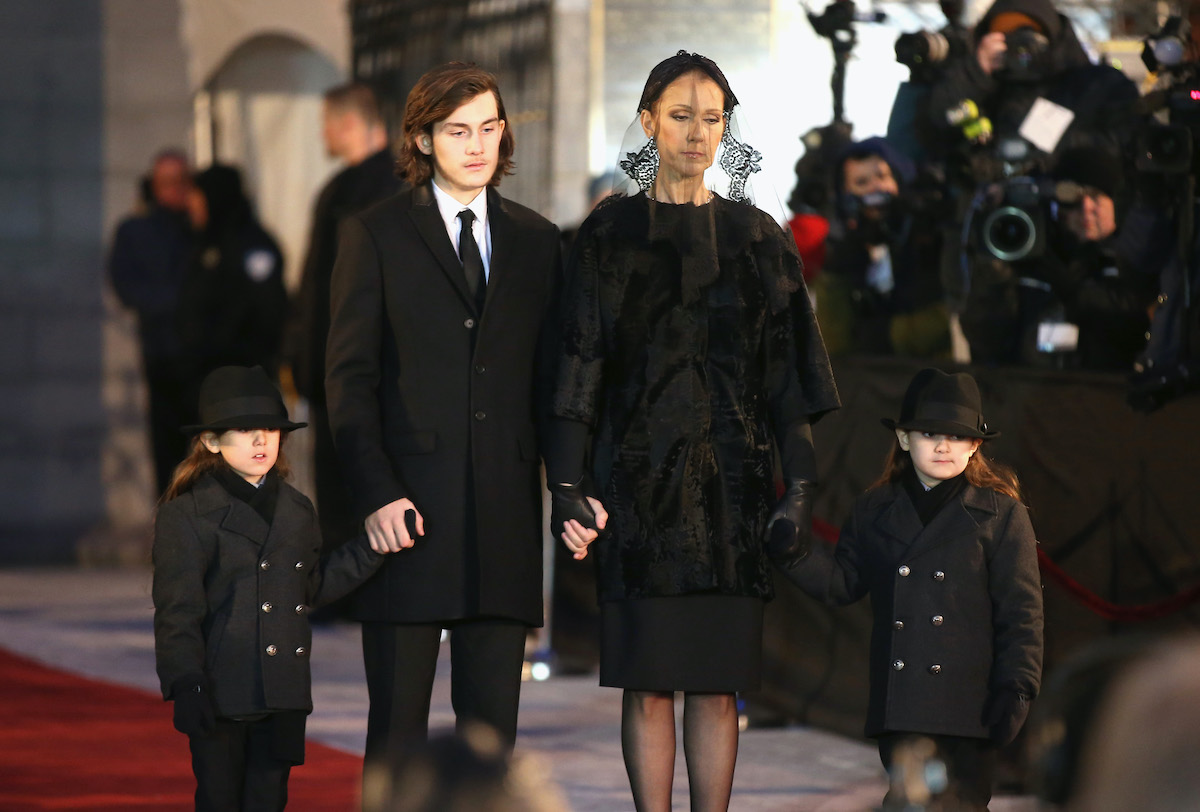 Celine Dion with sons at Husband Rene Angelil's funeral at Notre-Dame Basilica on January 22, 2016 in Montreal, Canada.