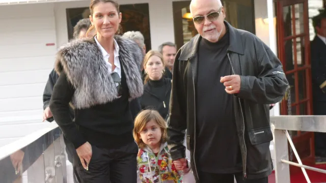 Canadian pop star Celine Dion, her husband Rene Angelil and their child Rene Charles seen enjoying week end in Paris in 2005