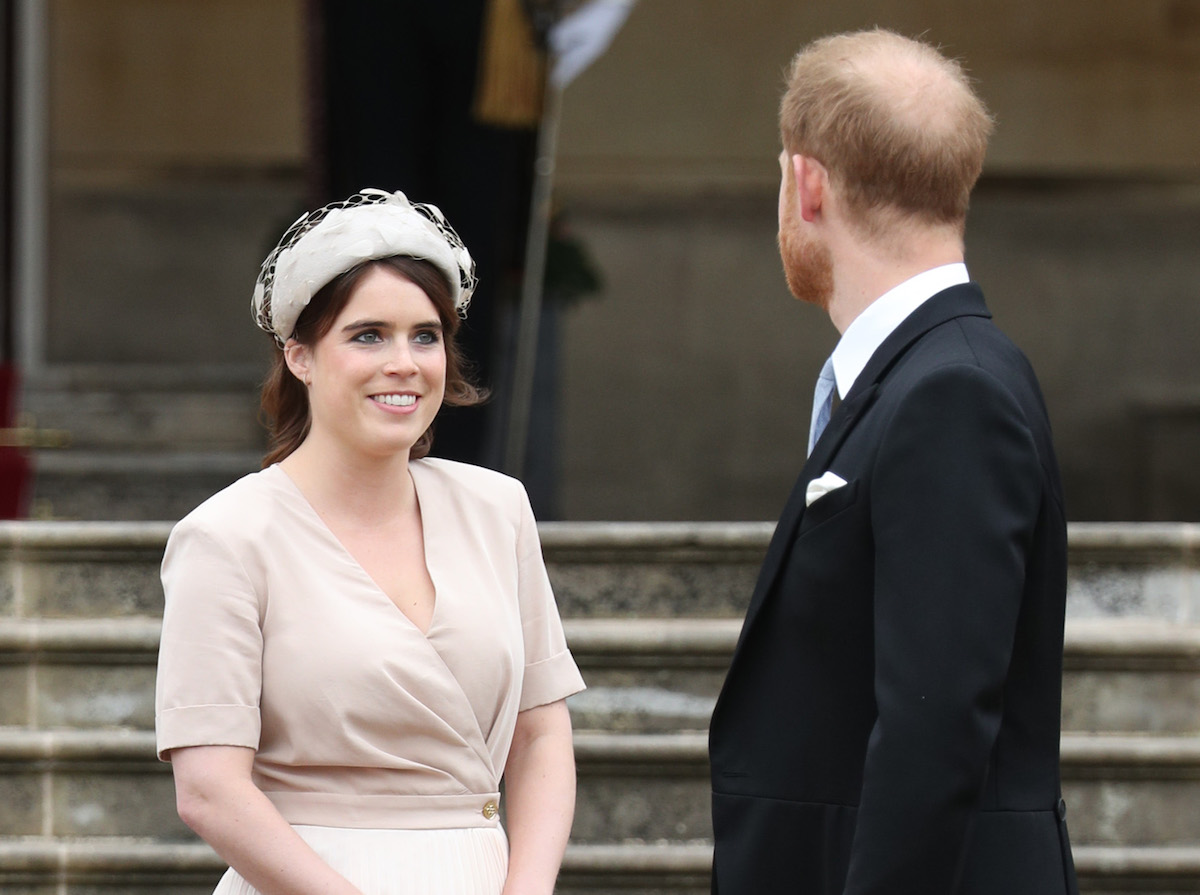 Princess Eugenie and the Duke of Sussex during a Royal Garden Party at Buckingham Palace in London.