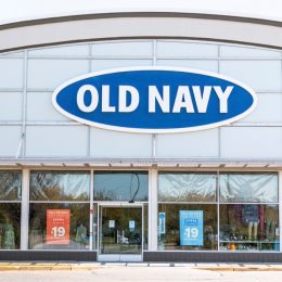 Bay Shore, New York, USA - 25 April 2020: The front of an Old Navy store in a strip mall empty due to the cdc rules during the coronavirus COVID-19 pandemic.