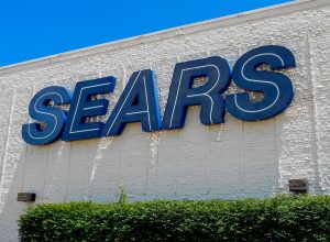 Fairview Heights, IL—June 1, 2018; Sears department store sign on the side of mall. Sears is a national retailer with more than 500 locations in the United States