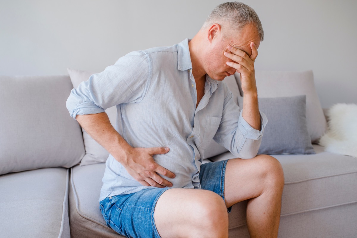 Older man with stomach pain