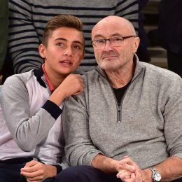 Nicholas and Phil Collins at a basketball game at Madison Square Garden in January 2015