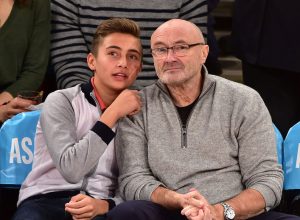 Nicholas and Phil Collins at a basketball game at Madison Square Garden in January 2015