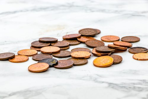 Pennies on marble counter