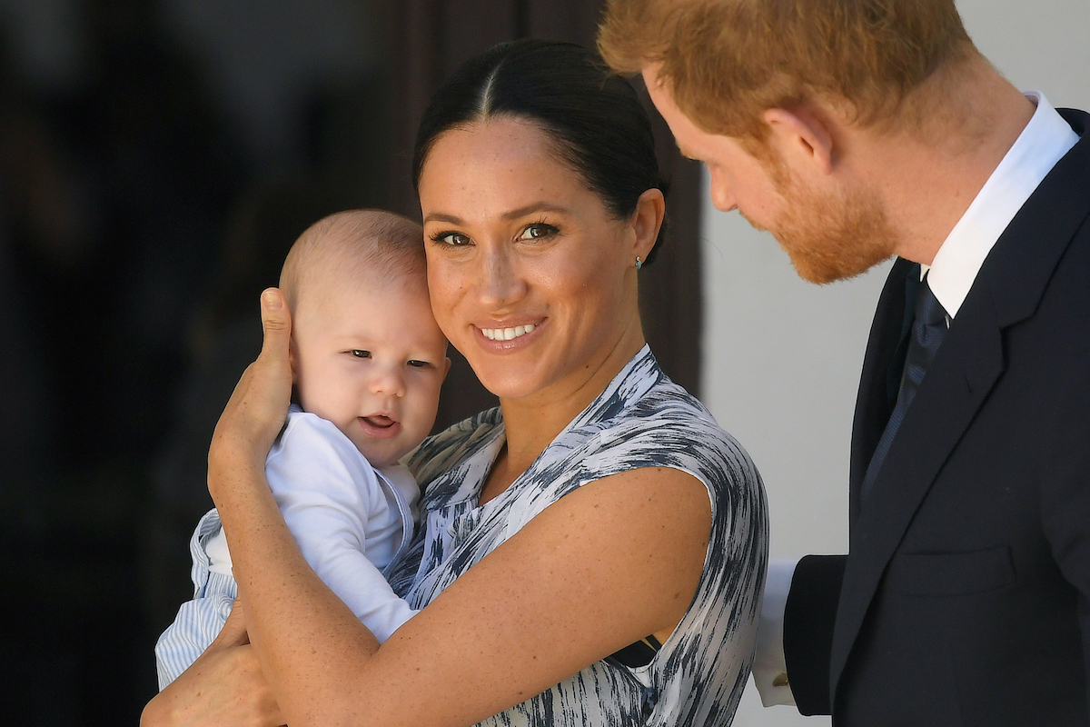 Britain's Prince Harry and his wife Meghan, Duchess of Sussex, holding their son Archie