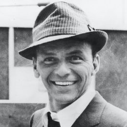 American singer and actor Frank Sinatra smiles at recording studio, 1950s.