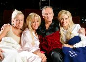 Hugh Hefner poses with Kendra Wilkinson (L) Bridget Marquardt and Holly Madison (R) before a screening of Bonnie and Clyde at the Playboy Mansion June 18, 2004 in Los Angeles, California.
