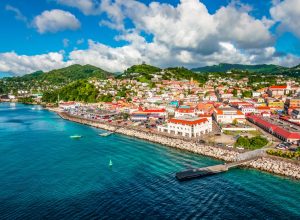 Bright and colorful image with buildings at the port of Grenada in the Caribbean.