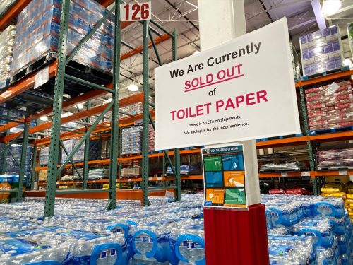 Coon Rapids, MN - April 8, 2020: Sign inside of a Costco Warehouse wholesale store lets customers know they are out of toliet paper during the COVID-19 Coronavirus outbreak pandemic