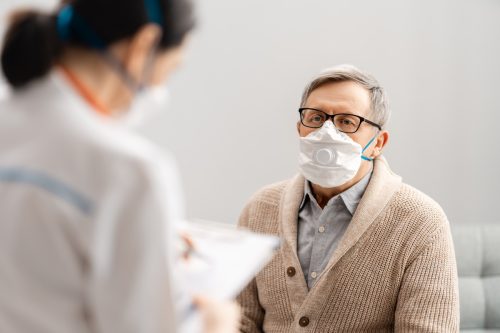 Patient wearing a mask in the doctor's office