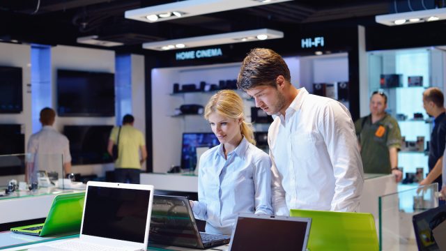 Couple shopping for a computer