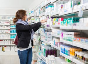 Woman shopping at pharmacy