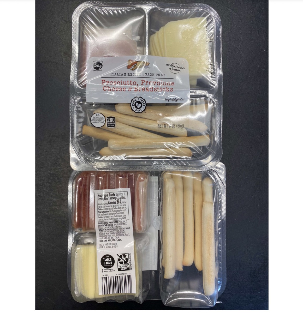 plastic snack tray with breadsticks and meat and cheese