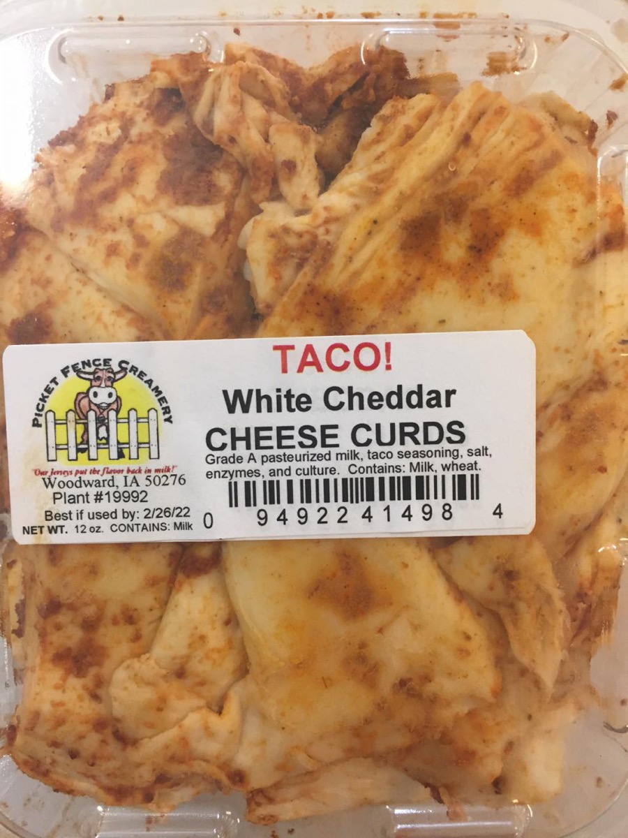 clear container of taco white cheddar cheese curds