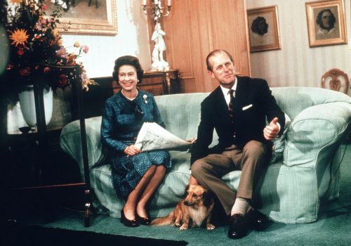Queen Elizabeth, Prince Philip, and their dog at Balmoral in 1974