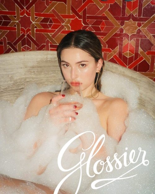 Eve Jobs modeling for Glossier's holiday 2020 campaign