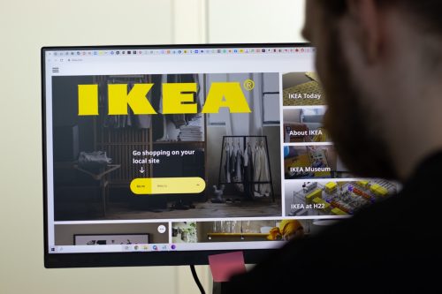 New York, USA - 26 April 2021: IKEA website page on screen, man using service, Illustrative Editorial